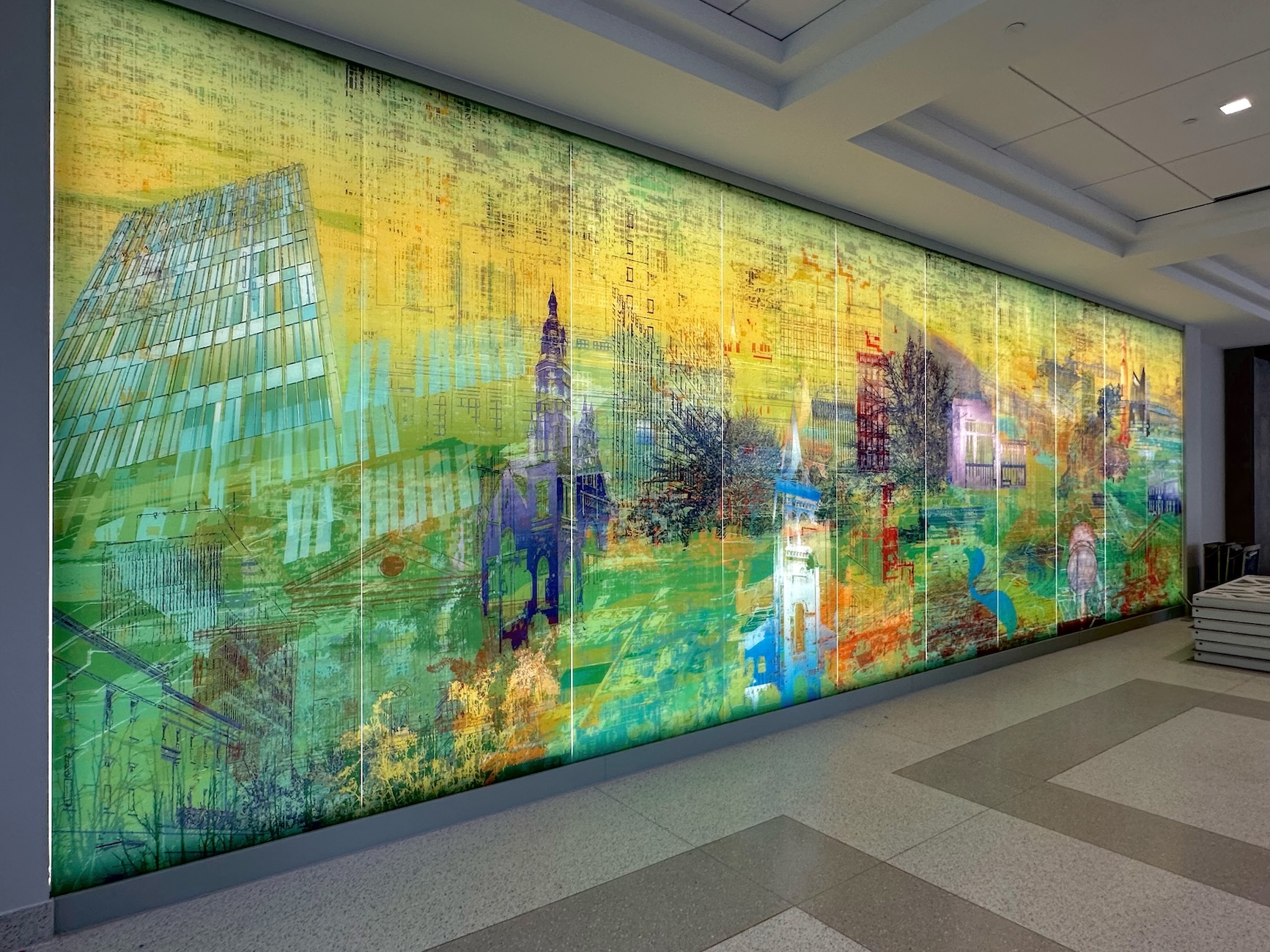 A mural with architectural and natural elements in green and yellow tones.