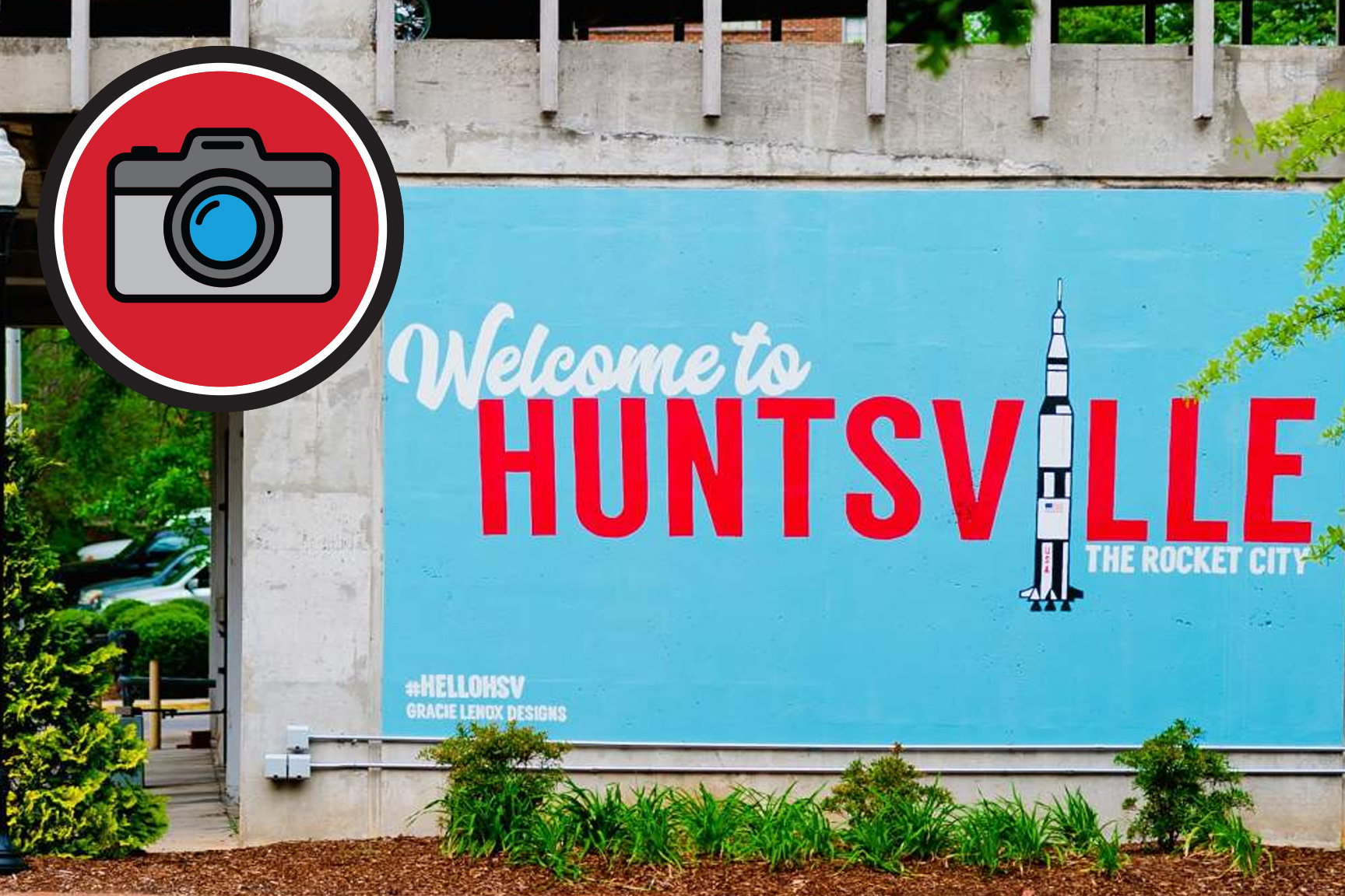 Exterior wall painted in light blue with text overlay that reads Welcome to Huntsville