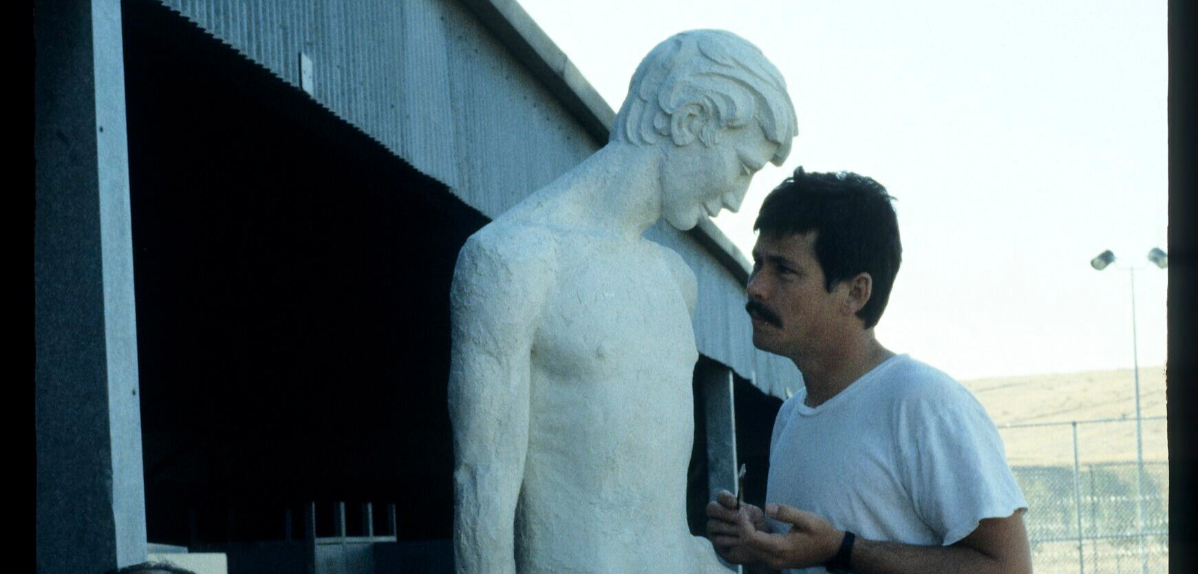 <h3>1988, Paul Buckner and team work on fabrication of cement mortar sculpture “Promise” for Department of Corrections</h3>