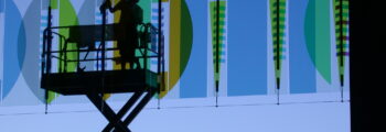 <h3>2004, John Rogers installing his work Glass Screen Project at University of Oregon Autzen Stadium</h3>