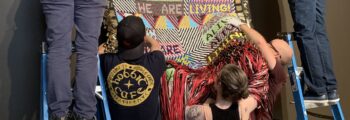 <h3>2016, Installation team hanging Jeffery Gibson’s work ALIVE! at Portland State University Vanport Building</h3>